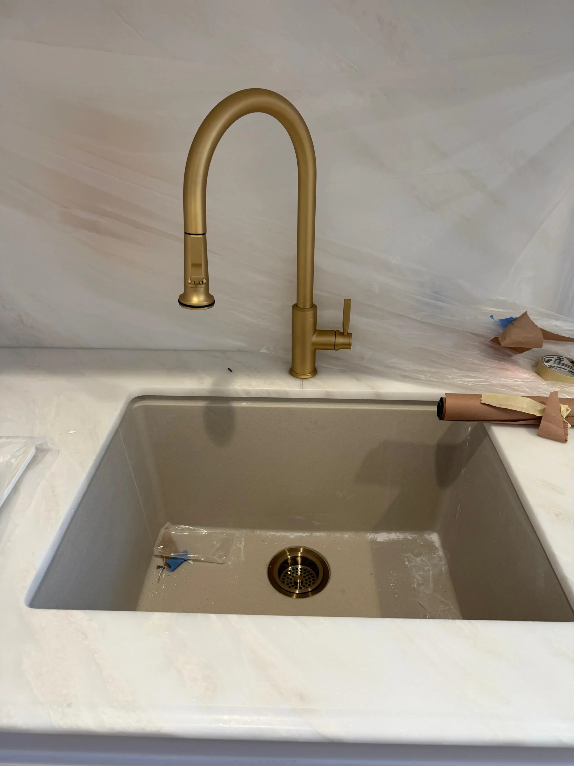 How to unclog a sink: kitchen sink with standing water caused by a clogged drain